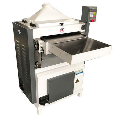 Appareil de pressage à vitesse double pour machines de travail du bois